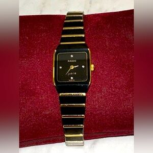 Black and gold with diamonds jubilee RADO watch